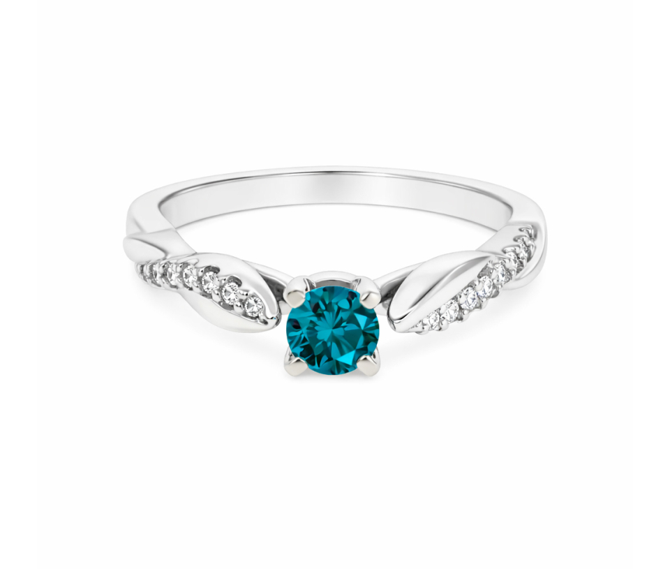 BAGUE EN OR AVEC UN DIAMANT BLEU BAGUE EN OR AVEC UN DIAMANT BLEU