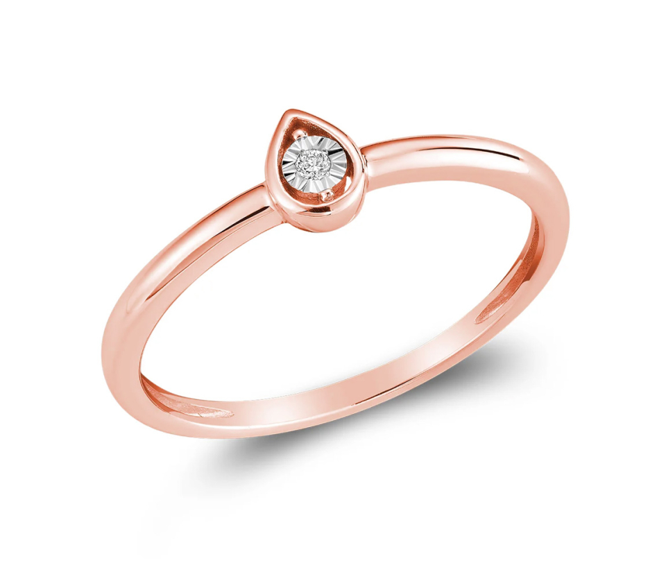 BAGUE ILLUSION EN OR 10K SERTIE D'UN DIAMANT BAGUE ILLUSION EN OR 10K SERTIE D'UN DIAMANT