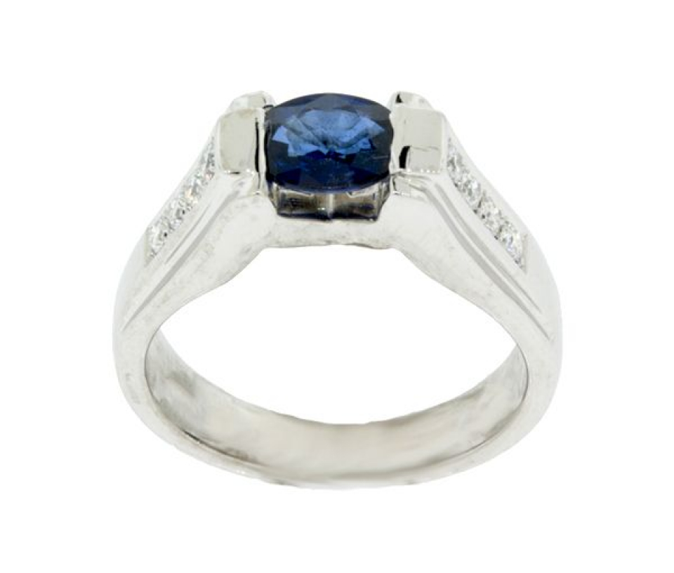 BAGUE EN OR 18K BLANC SERTIE DE DIAMANTS ET D'UN SAPHIR BLEU - FI WP185570 - BIJOUTERIE SUISSE INC. BAGUE EN OR 18K BLANC SERTIE DE DIAMANTS ET D'UN SAPHIR BLEU - FI WP185570 - BIJOUTERIE SUISSE INC.
