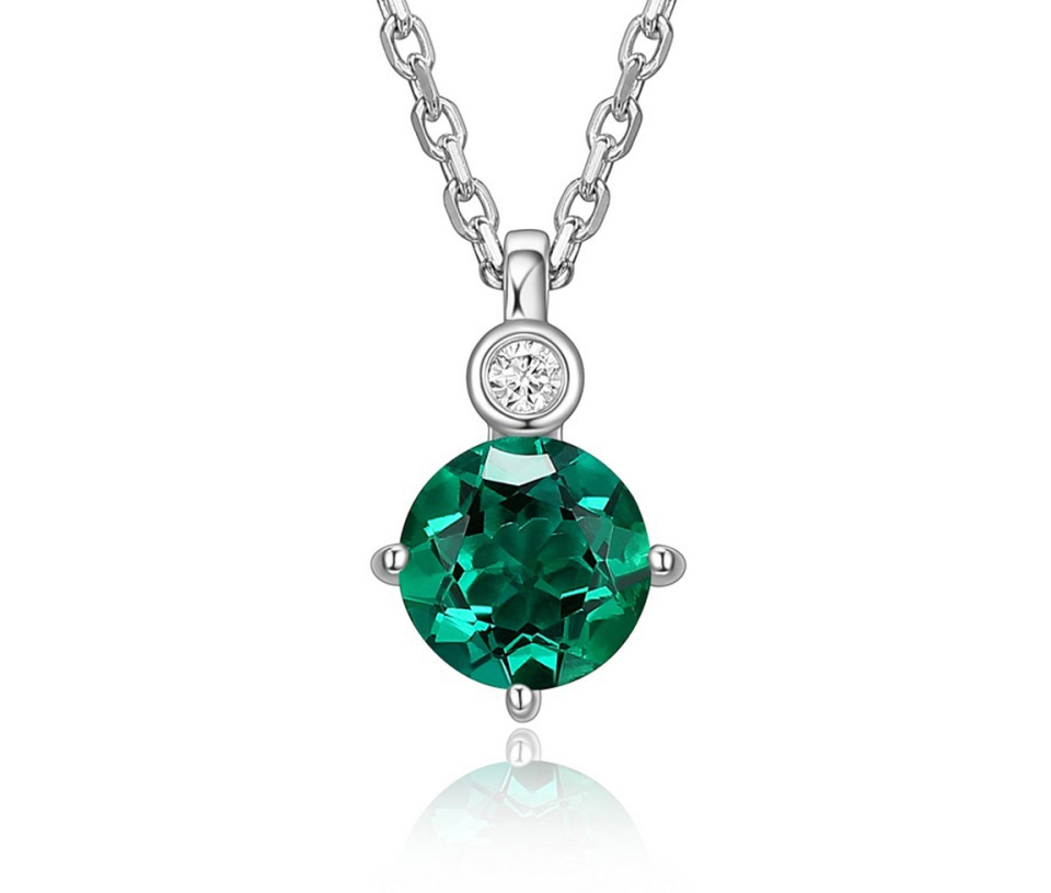PENDENTIF AVEC PIERRE VARIEES VERITABLES ET D'UN DIAMANT
