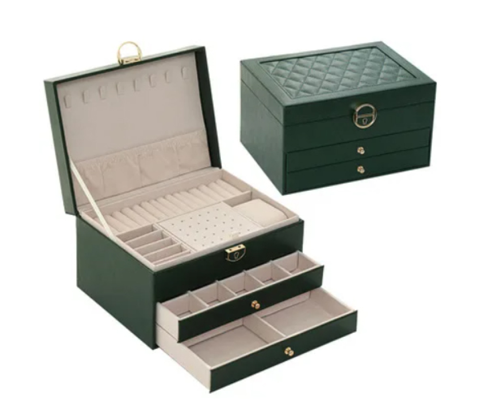 COFFRE À BIJOUX EN CUIR CAPITONNÉ - SJ COPU/VT - BIJOUTERIE SUISSE INC.